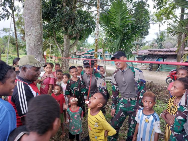 Sambut HUT Yonif 132/BS Ke-64, Prajurit Bima Sakti Adakan Perlombaan Bersama Masyarakat