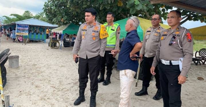 Polres Toba Amankan Lokasi  Wisata Pantai Pasir Putih yang Ramai Dikunjungi