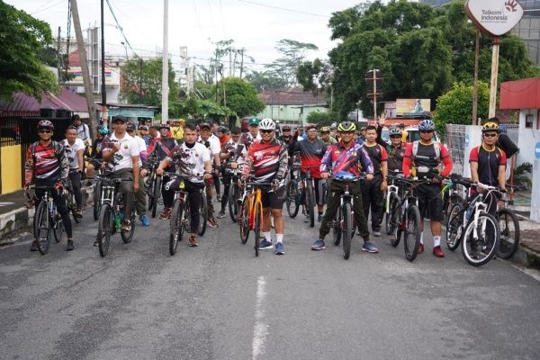 Korem 022/PT Gelar Gowes dan Bansos Kepada Masyarakat di Nagori Bandar Selamat