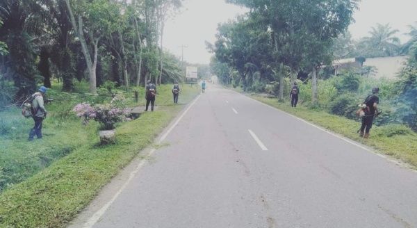 Pemkab Labura Bersihkan Jalan Simpang Marbau